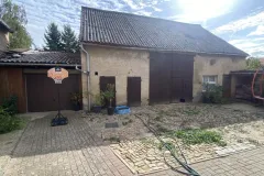 Freistehendes Einfamilienhaus in Kunrau/Klötze: Ansicht von Nebengelass und Garage im Hof